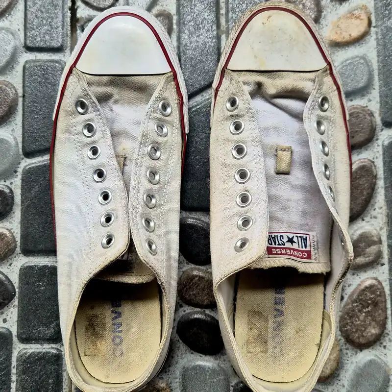 Side by side: the left shoe cleaned with the SimplyKIT soap, the right shoe still dirty